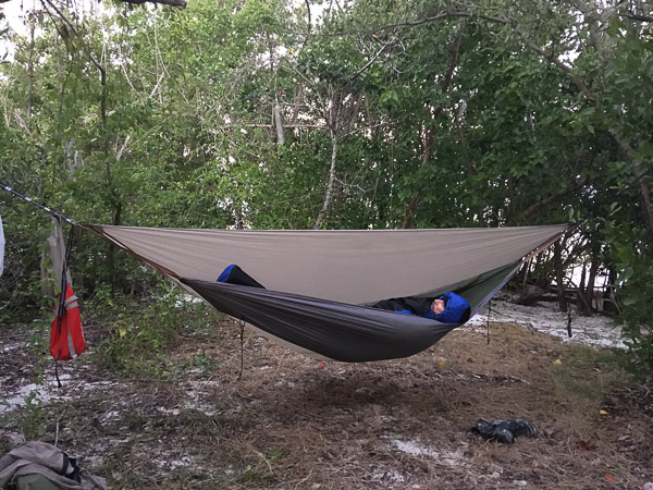 Note use of the rainfly as a windbreak!