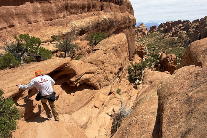 Climbing Down Along a Sandstone Ridge